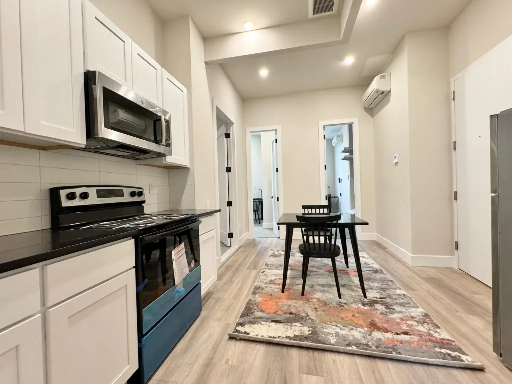 61-Delmonico-Pl-1A-Kitchen-and-Livingroom